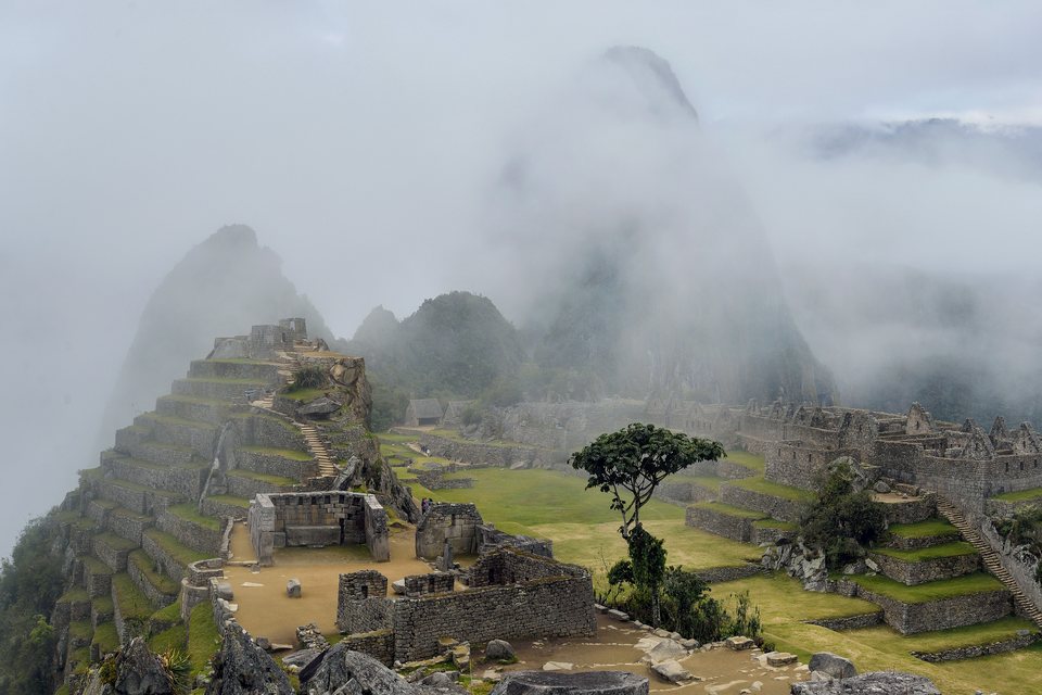 The stone terraces and ruins of Machu Picchu below Huayna Picchu.